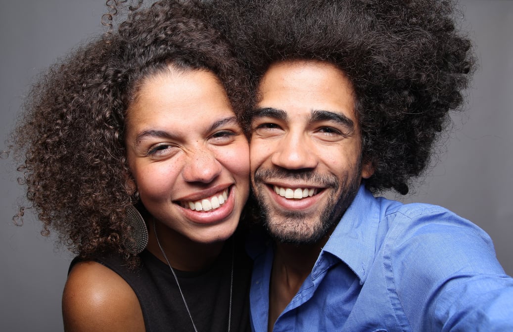 Happy love couple in a Photo Booth